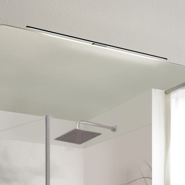 The elegant ld8104a light fixture, featuring a mirror and soft lighting, adds a stylish touch to any modern space.