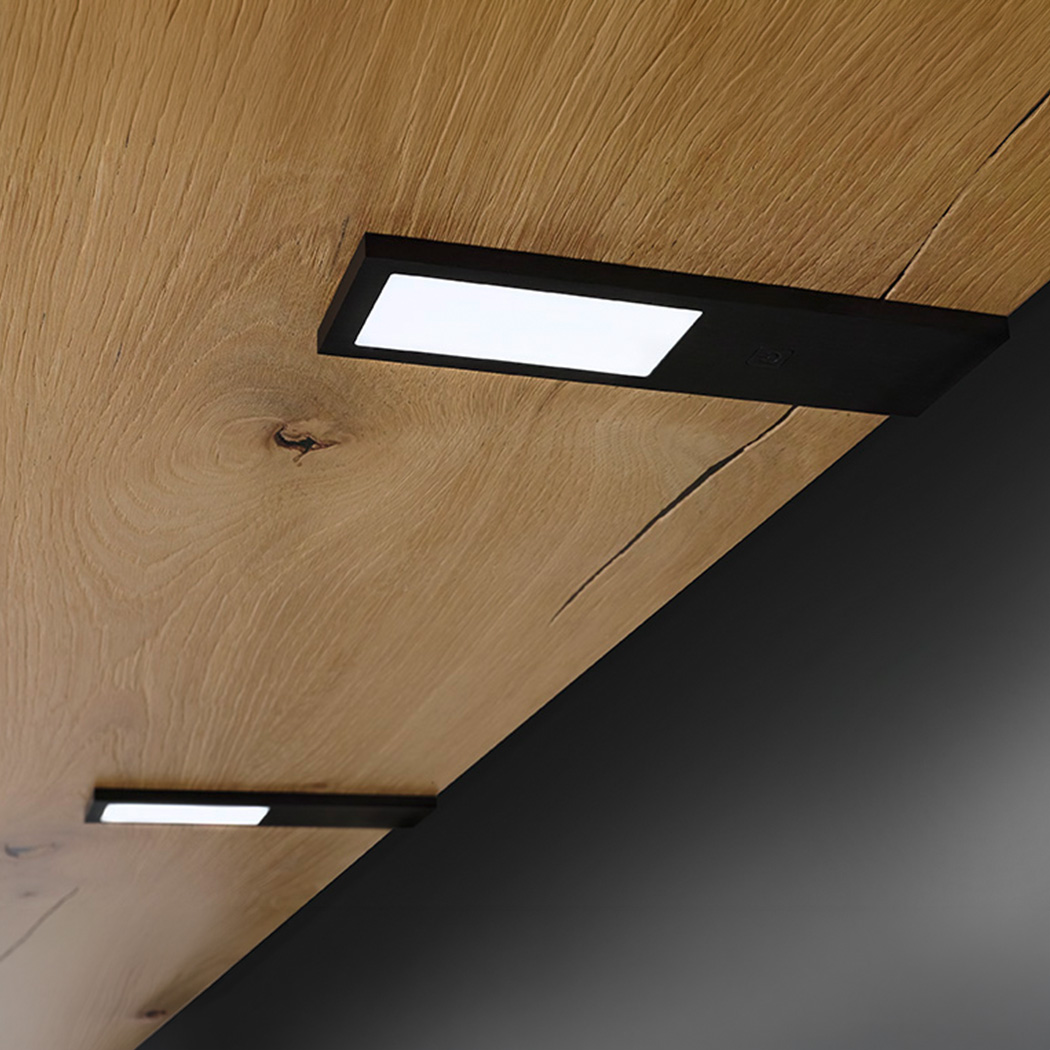 LD 8142 in black, mounted beneath a wooden shelf with a rustic grain.