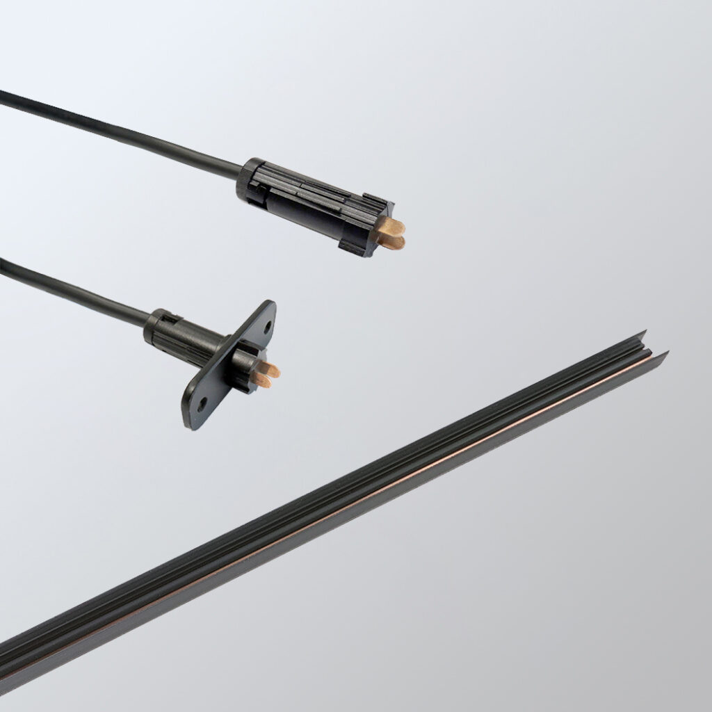 Die Vario D10 Stromschiene und der Stromabnehmer sind in einem modernen Design angeordnet und zeigen ihre technische Präzision.